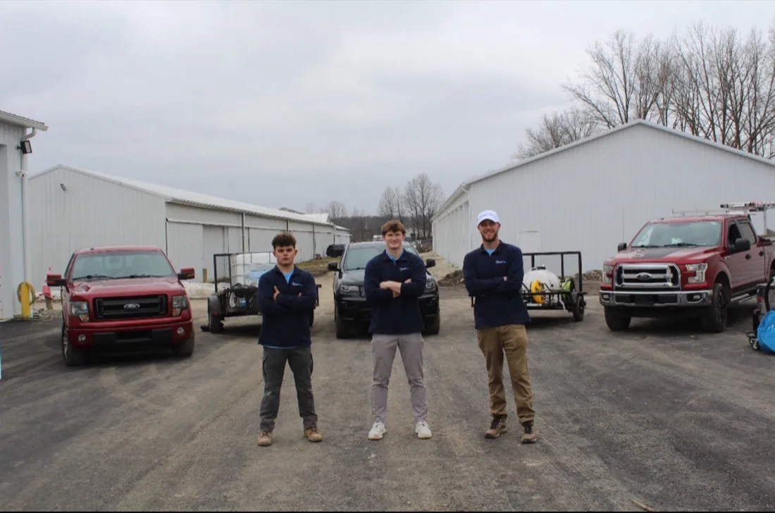 The PowerClean Pros crew on a job with the truck and rig