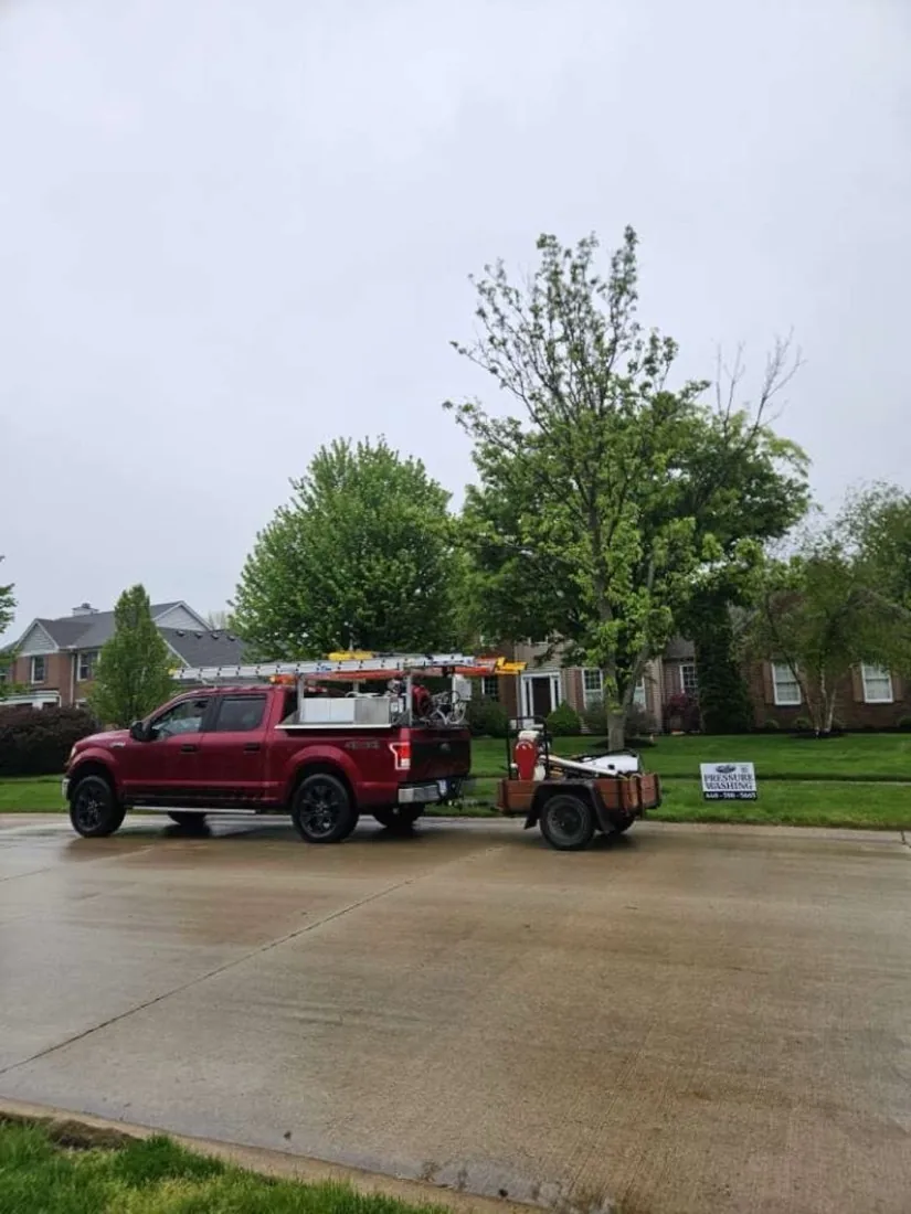 Pressure washing a concrete driveway