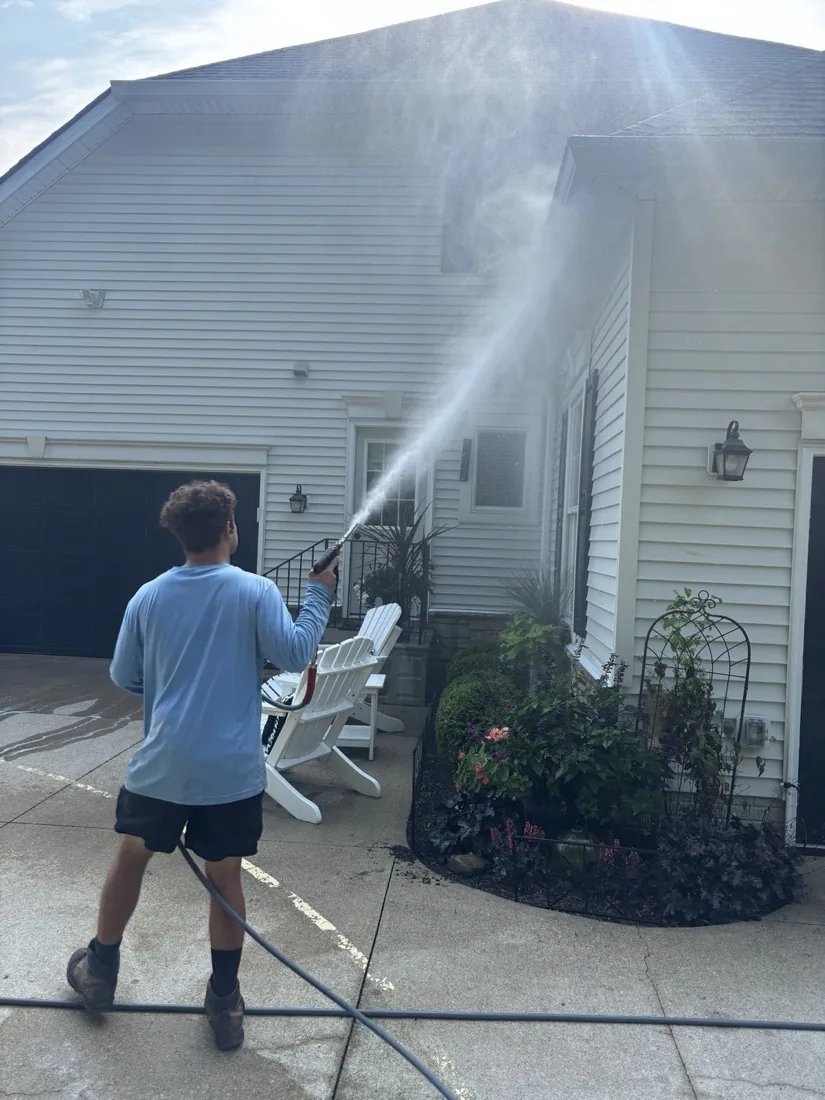 Soft washing the front elevation with a low-pressure spray